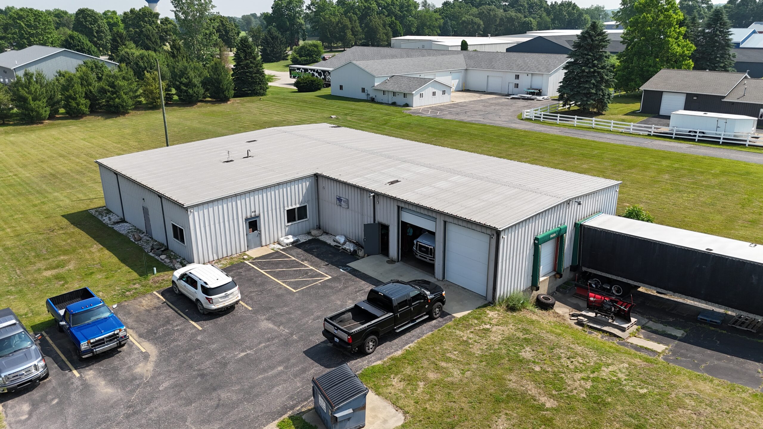Aerial view of multiple warehouse roofs 2