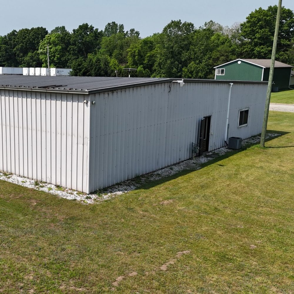 White warehouse roof, aerial